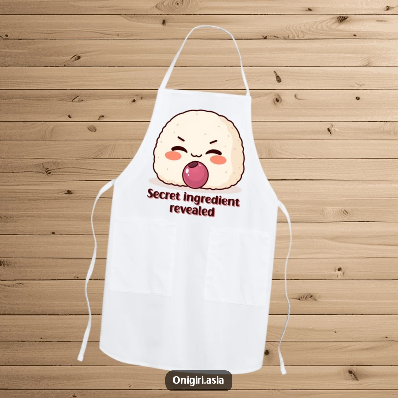 Funny Mischievous Onigiri Apron showing a grinning rice ball character offering a plum, ready for playful cooking.