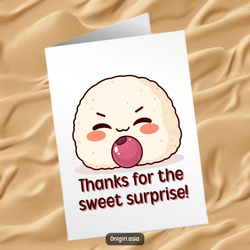 Funny Free Printable Thank You Card: An onigiri with a sly grin offers a tiny plum filling, a sweet and cheeky thank you.